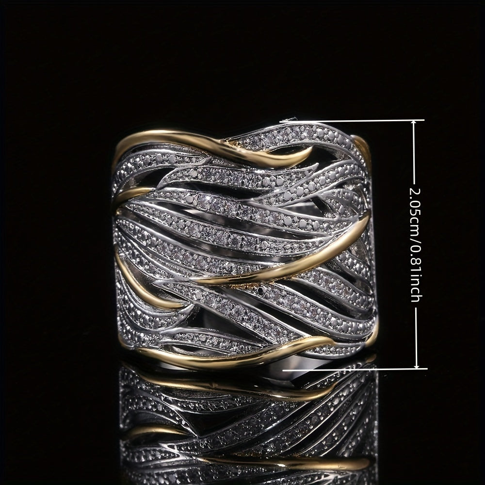 RHEA – TWISTED BAND RING